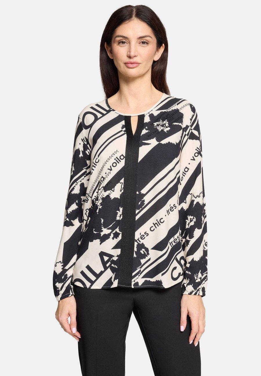 Блуза Betty Barclay MIT RUNDHALSAUSSCHNITT, Weiß/Schwarz/White
Блуза Betty Barclay MIT RUNDHALSAUSSCHNITT, Weiß/Schwarz/White