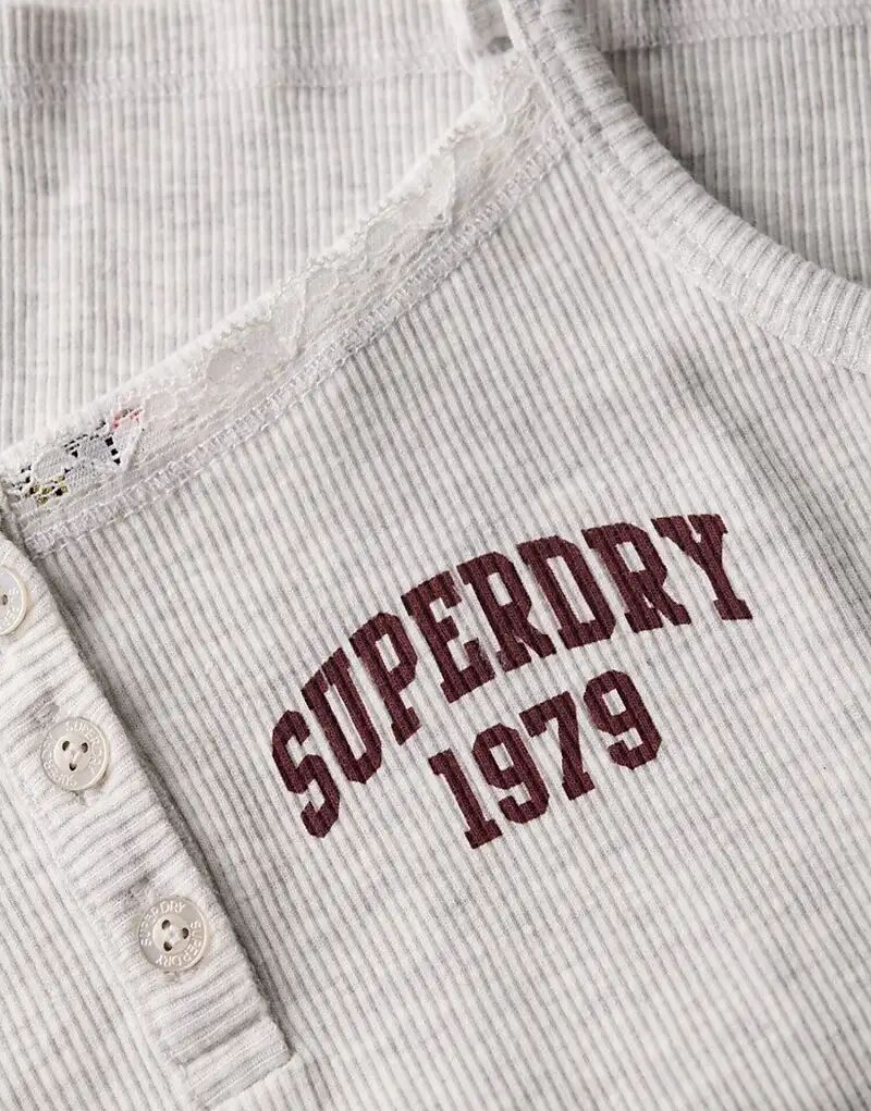 Майка с графическими пуговицами Superdry Athletic essentials в цвете «ледяной серый меланж»
Майка с графическими пуговицами Superdry Athletic essentials в цвете «ледяной серый меланж»