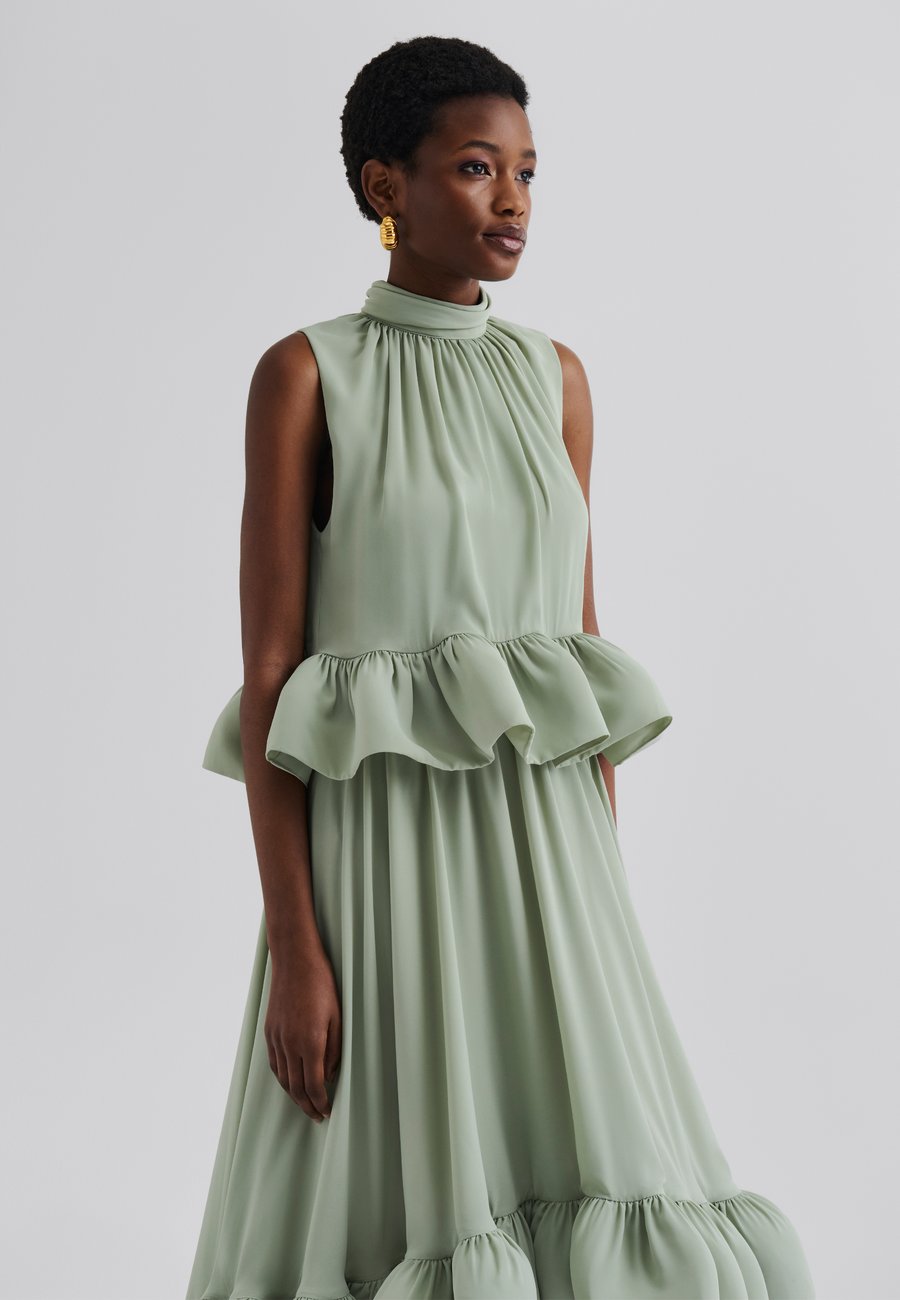 Блуза Malina LUNE HALTERNECK FRILLED BLOUSE, Sage/Light Green
Блуза Malina LUNE HALTERNECK FRILLED BLOUSE, Sage/Light Green