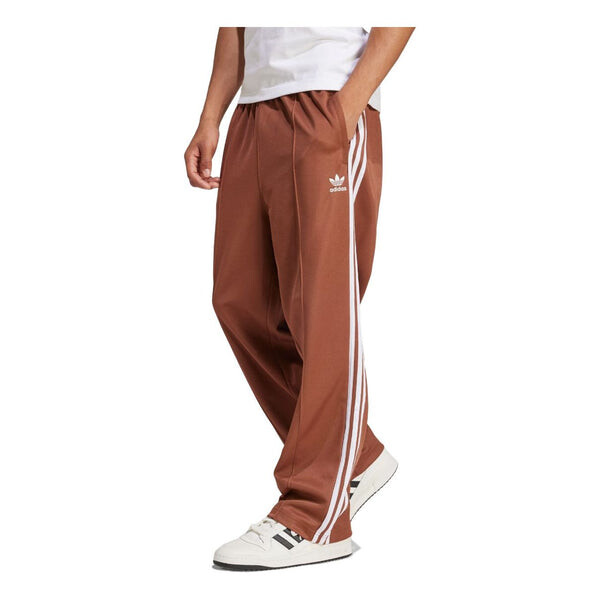 Штаны adicolor baggy fit firebird спортивные штаны Adidas, коричневый
Штаны adicolor baggy fit firebird спортивные штаны Adidas, коричневый