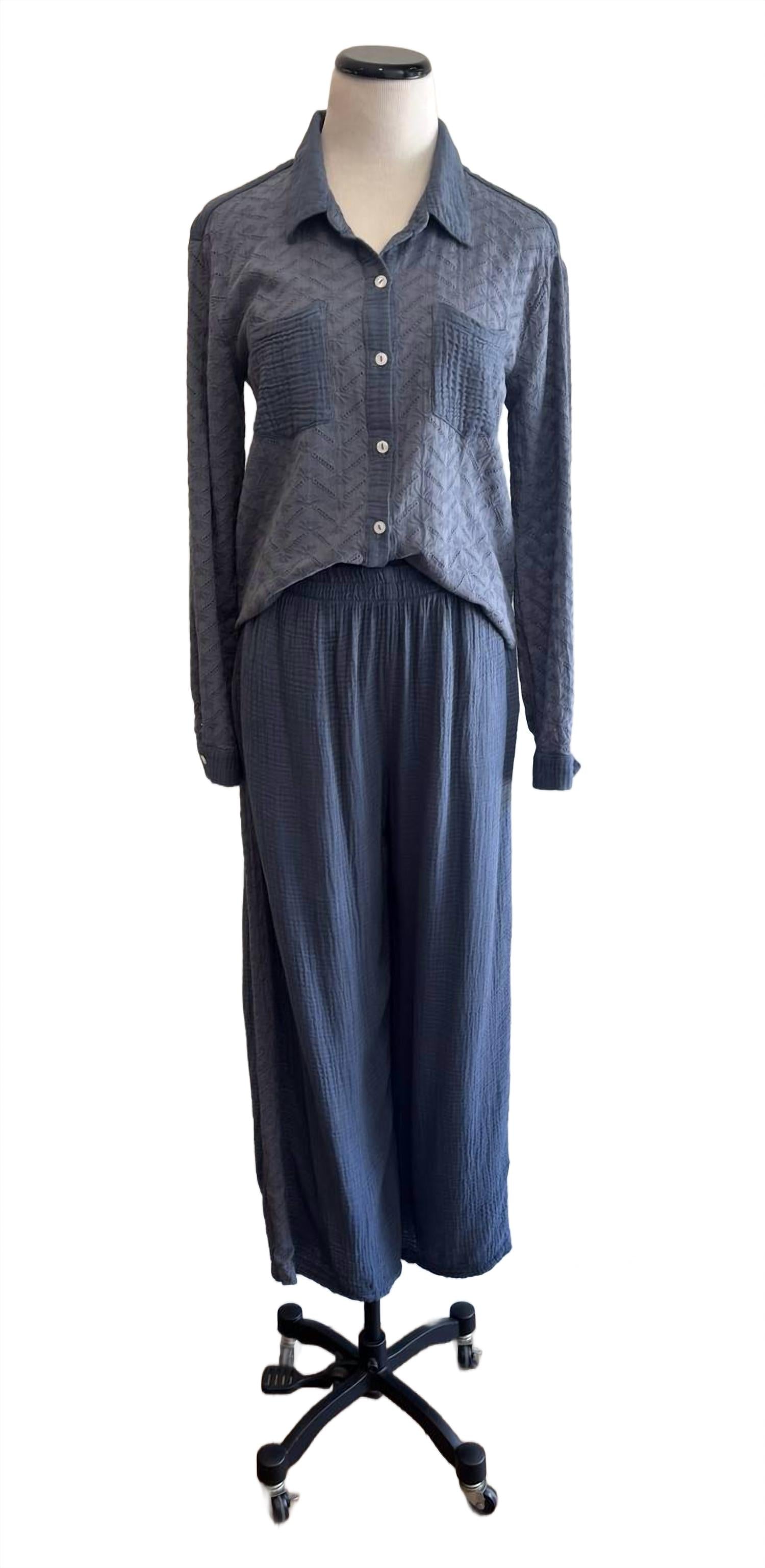 Синие брюки с люверсами Red haute
Синие брюки с люверсами Red haute