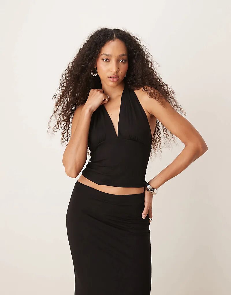 Облегающий топ Gina Tricot co-ord из мягкого джерси с глубоким вырезом и халтером, черного цвета
Облегающий топ Gina Tricot co-ord из мягкого джерси с глубоким вырезом и халтером, черного цвета