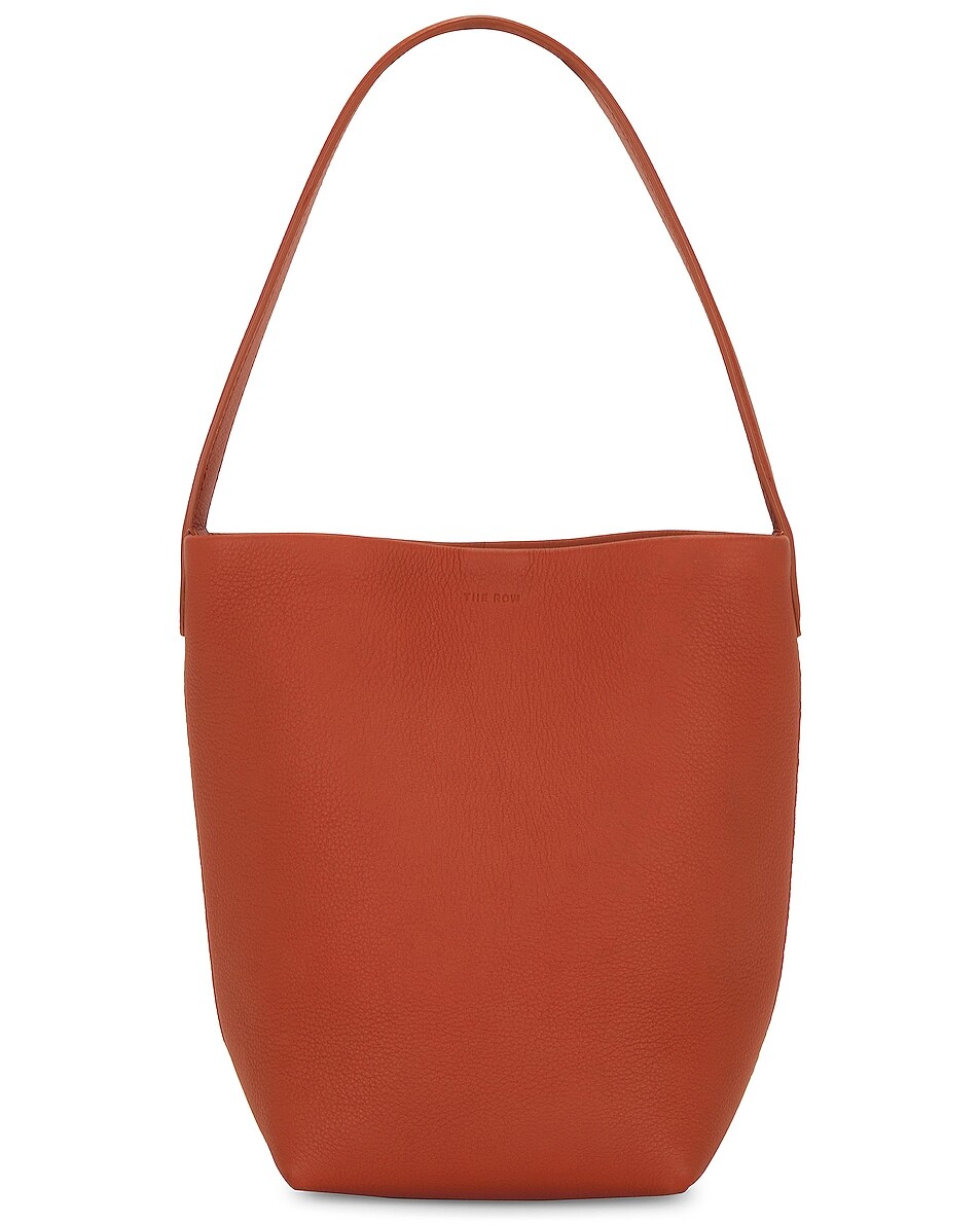 Маленькая большая сумка-парка N/S The Row, цвет Rust Pld
Маленькая большая сумка-парка N/S The Row, цвет Rust Pld