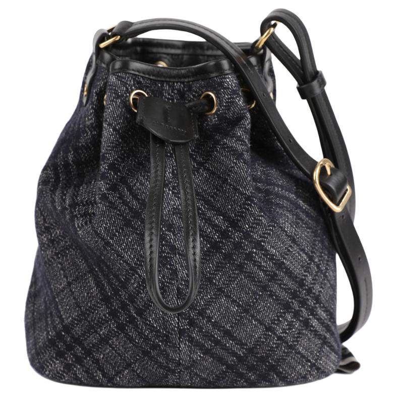 Burberry Хлопковая серая сумка-ведро женская через плечо
Burberry Хлопковая серая сумка-ведро женская через плечо