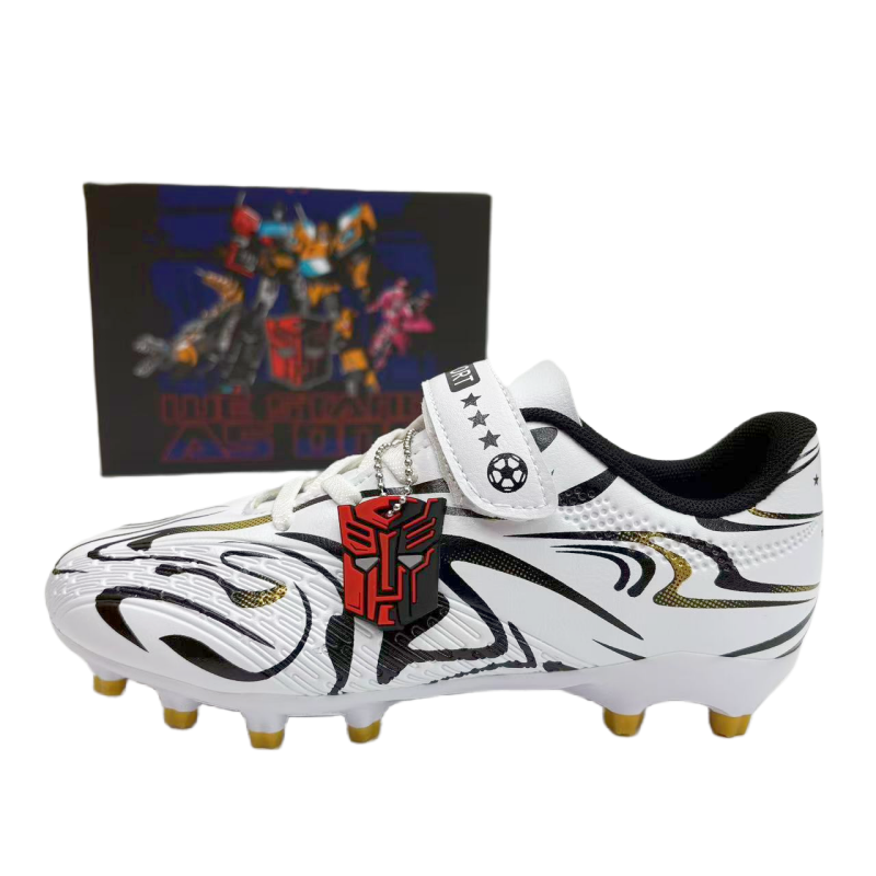 Детские футбольные бутсы Anti Kick Low Top TRANSFORMERS, белый/золотой
Детские футбольные бутсы Anti Kick Low Top TRANSFORMERS, белый/золотой