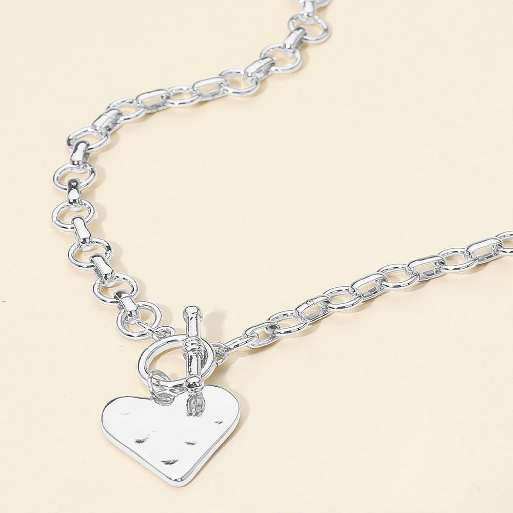 Массивное ожерелье-тогл с кулоном в виде сердца из кованого металла - родий Fashnzfab, Rhodium
Массивное ожерелье-тогл с кулоном в виде сердца из кованого металла - родий Fashnzfab, Rhodium
