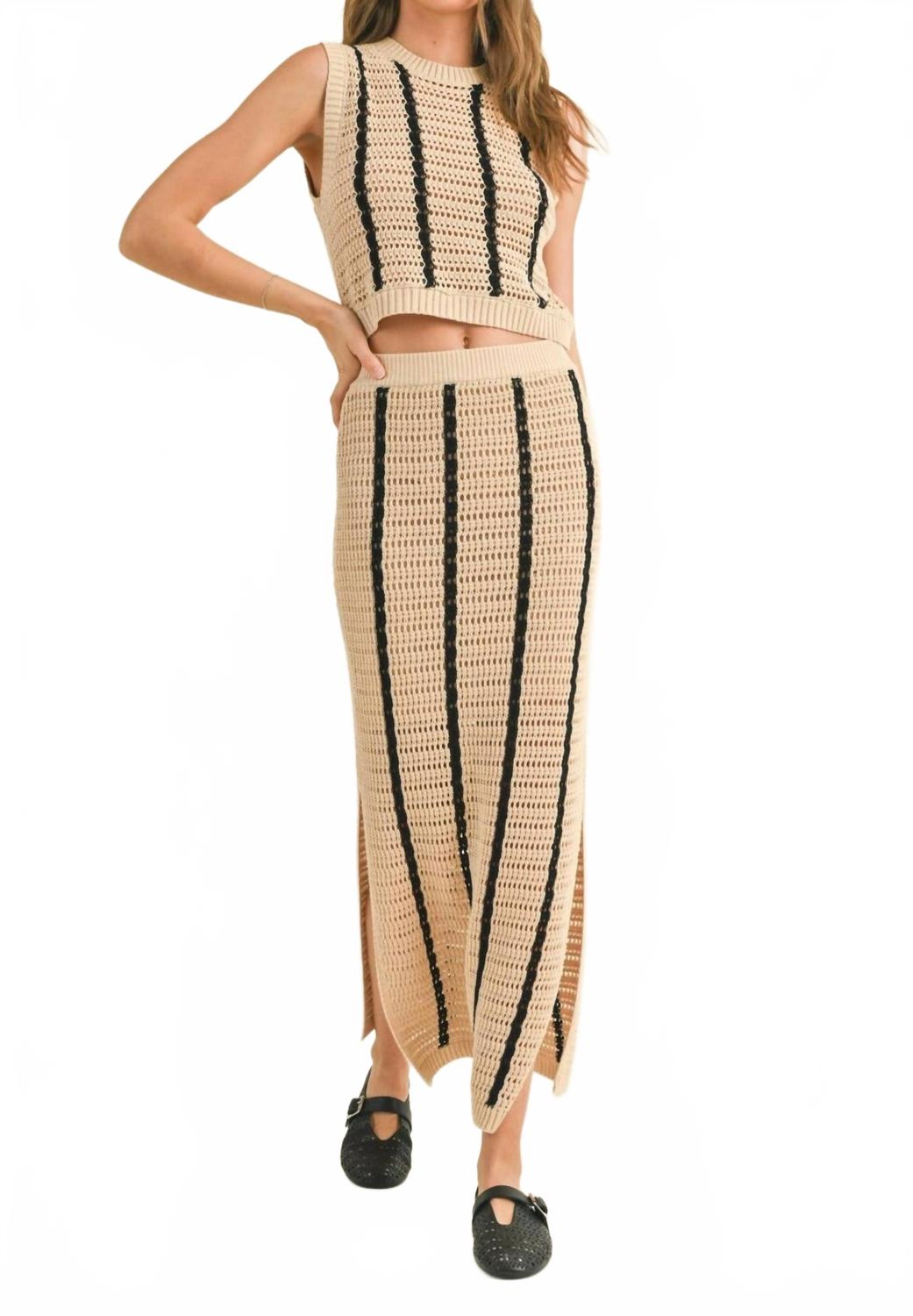 Полосатая вязаная крючком длинная макси-юбка в бежево-черном цвете MIOU MUSE
Полосатая вязаная крючком длинная макси-юбка в бежево-черном цвете MIOU MUSE