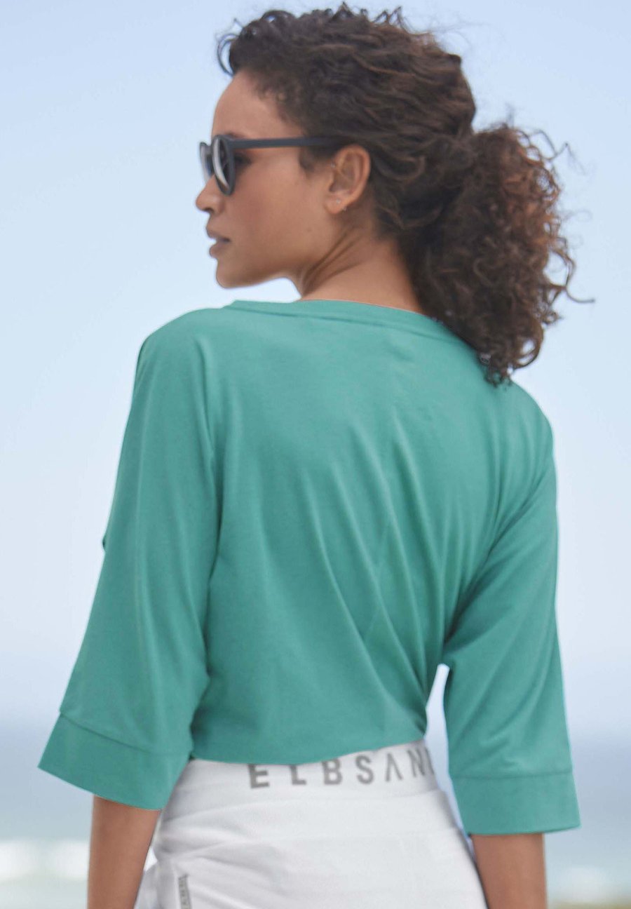 Топ Elbsand 3/4-ARM, Seaweed Teal/Green
Топ Elbsand 3/4-ARM, Seaweed Teal/Green
