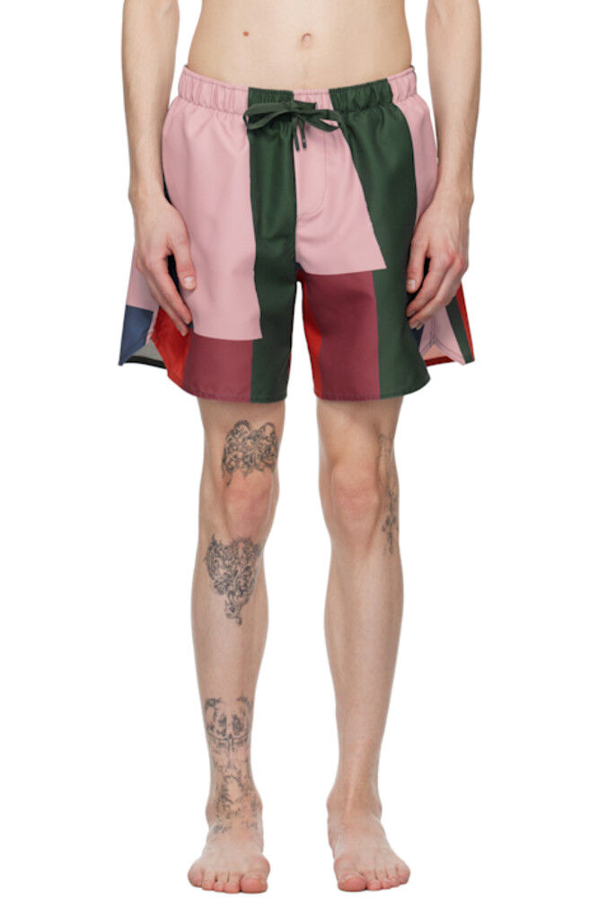 Шорты для плавания с принтом «Разноцветные полосы» JW Anderson
Шорты для плавания с принтом «Разноцветные полосы» JW Anderson