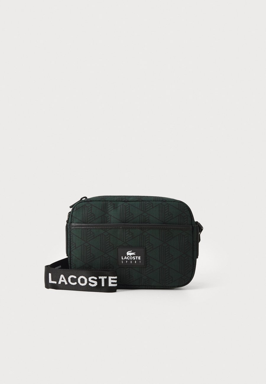 Сумка кросс-боди Lacoste REPORTER BAG, Mono Sinople Noir/Black
Сумка кросс-боди Lacoste REPORTER BAG, Mono Sinople Noir/Black