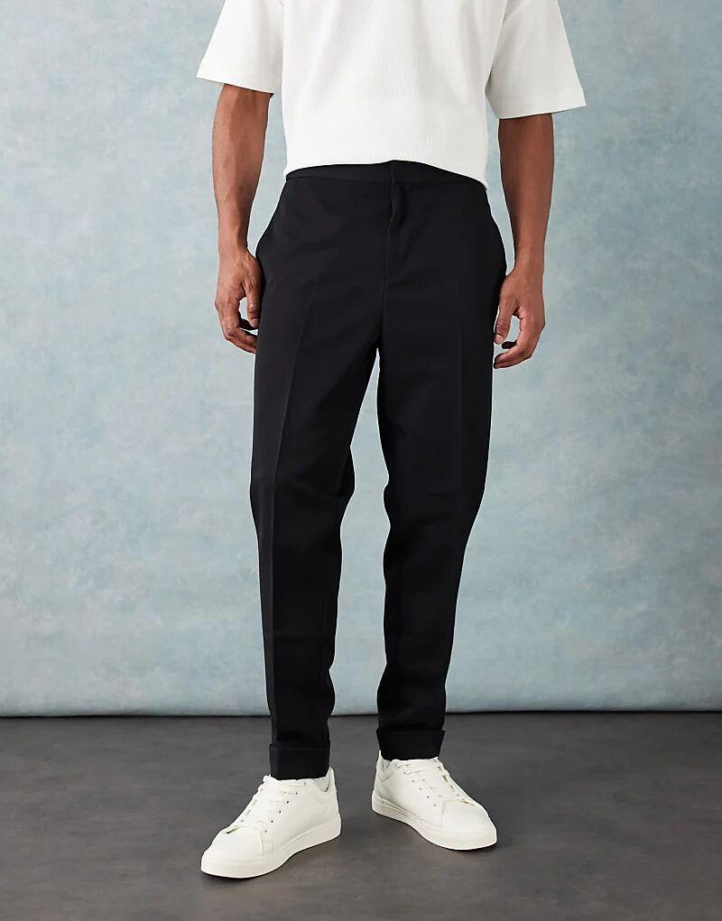 Зауженные брюки ASOS DESIGN черного цвета с отворотами и эластичным поясом
Зауженные брюки ASOS DESIGN черного цвета с отворотами и эластичным поясом