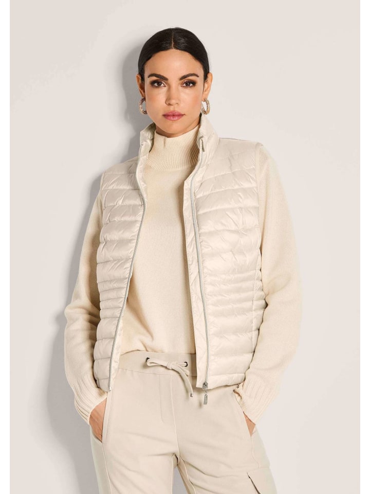 MADELEINE Укороченный стеганый жилет для женщин жемчужно-белого цвета
MADELEINE Укороченный стеганый жилет для женщин жемчужно-белого цвета