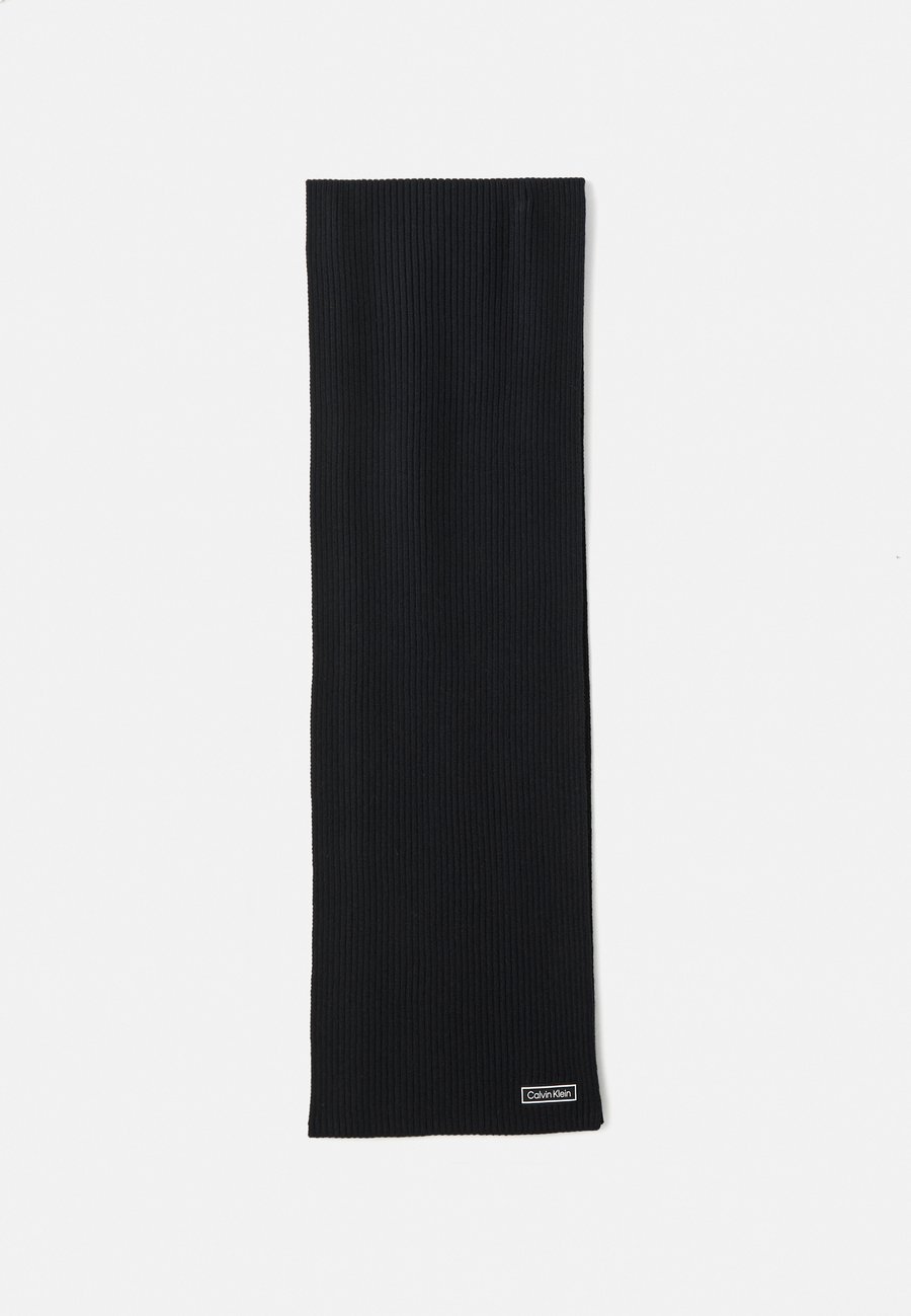 Шарф Calvin Klein PATCH CHUNKY UNISEX, Black
Шарф Calvin Klein PATCH CHUNKY UNISEX, Black
