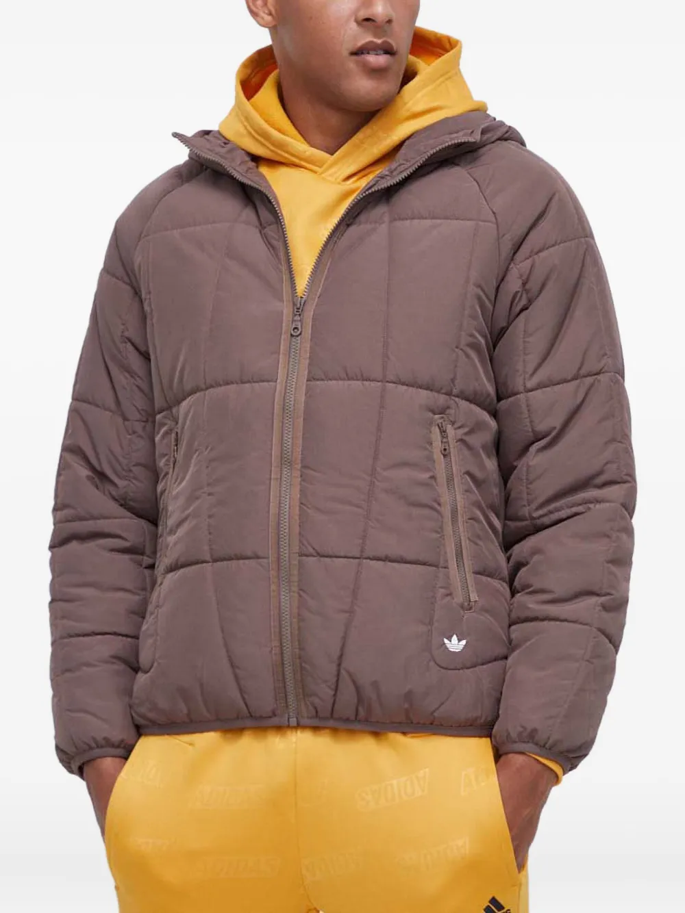 Стеганая куртка с капюшоном adidas, коричневый
Стеганая куртка с капюшоном adidas, коричневый