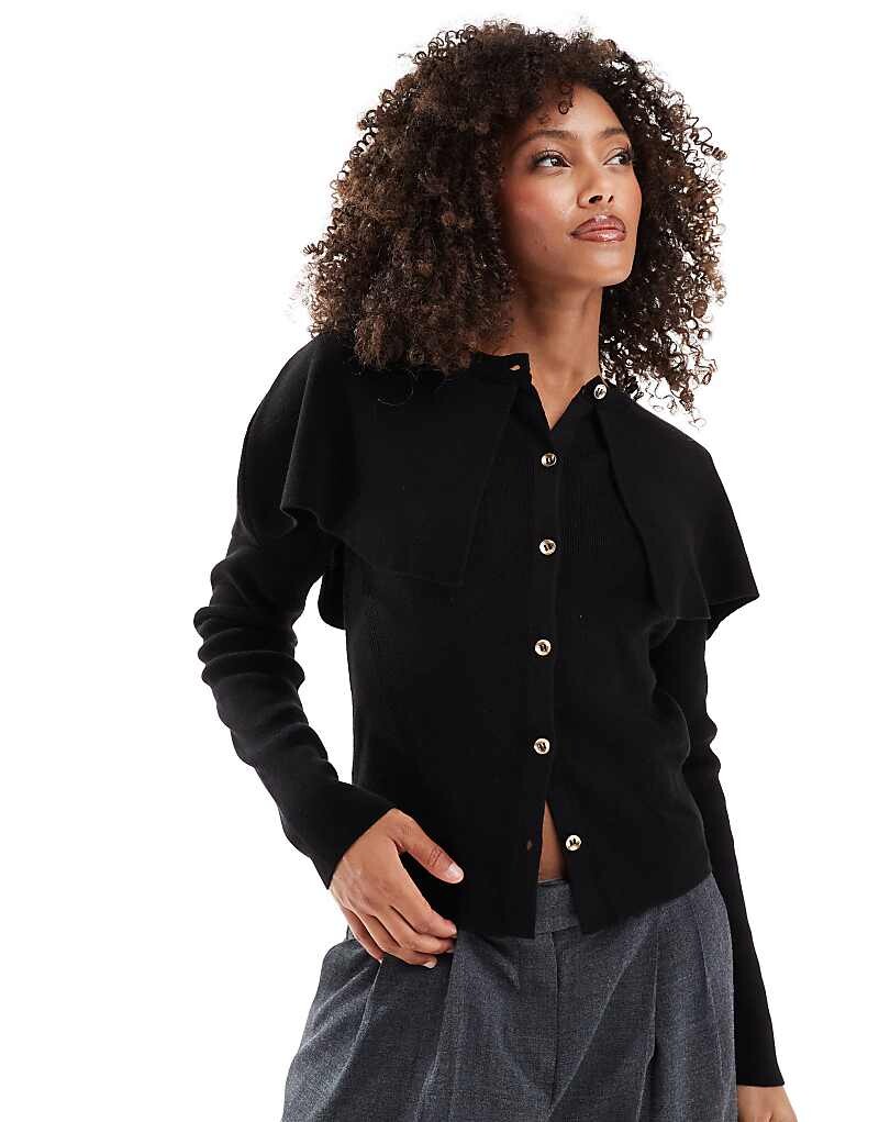 ASOS DESIGN – черный вязаный кардиган с круглым вырезом и накидкой
ASOS DESIGN – черный вязаный кардиган с круглым вырезом и накидкой