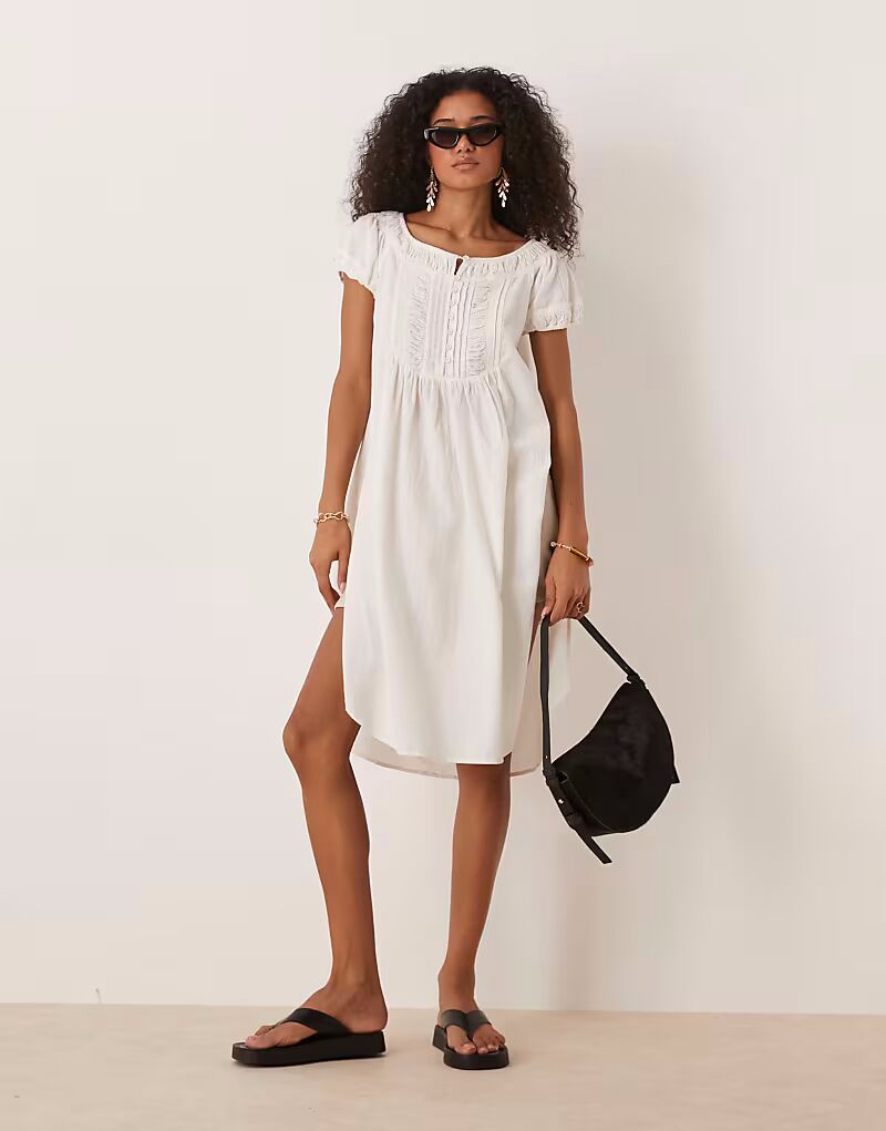 Туника-топ миди Free People в стиле бохо цвета слоновой кости
Туника-топ миди Free People в стиле бохо цвета слоновой кости