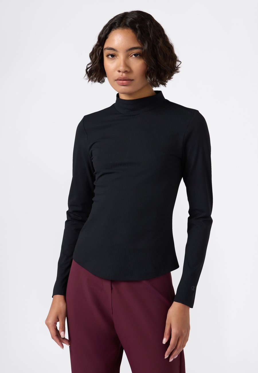 Топ Champion Long sleeved top, Black
Топ Champion Long sleeved top, Black