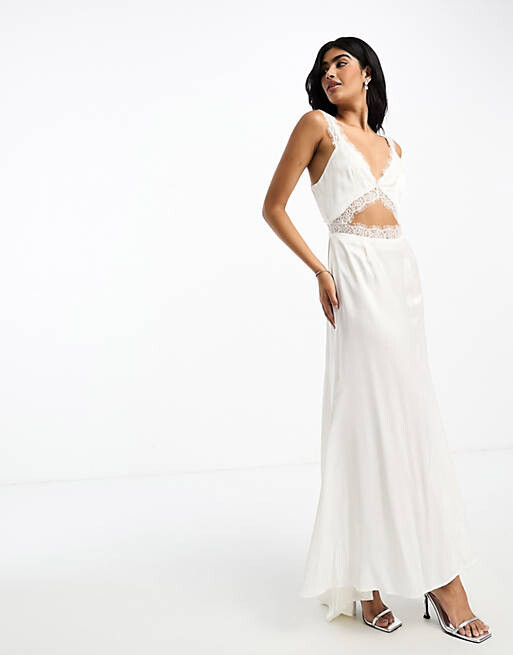 Платье макси цвета слоновой кости из атласного кружева с рыбьим хвостом Never Fully Dressed Bridal
Платье макси цвета слоновой кости из атласного кружева с рыбьим хвостом Never Fully Dressed Bridal