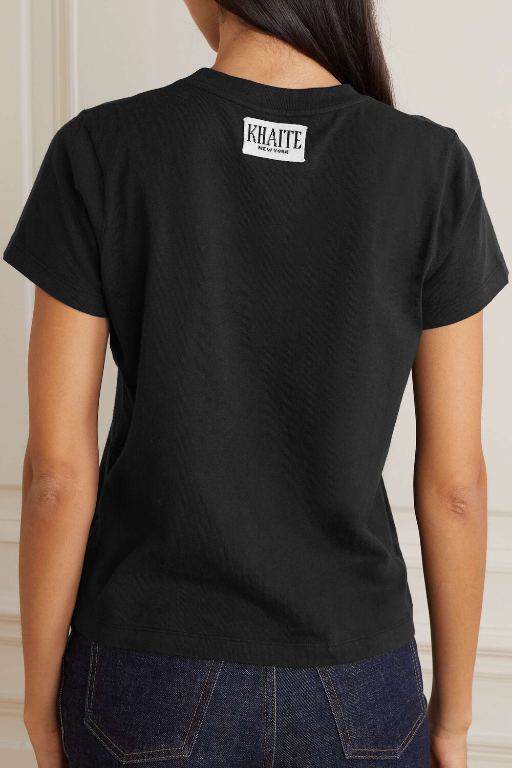 KHAITE футболка Emmylou из хлопкового джерси, черный
KHAITE футболка Emmylou из хлопкового джерси, черный