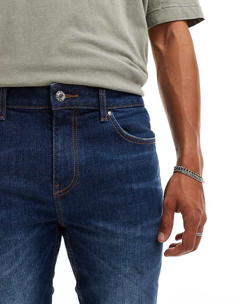 ASOS DESIGN – темно-синие джинсы скинни с эффектом потертости
ASOS DESIGN – темно-синие джинсы скинни с эффектом потертости