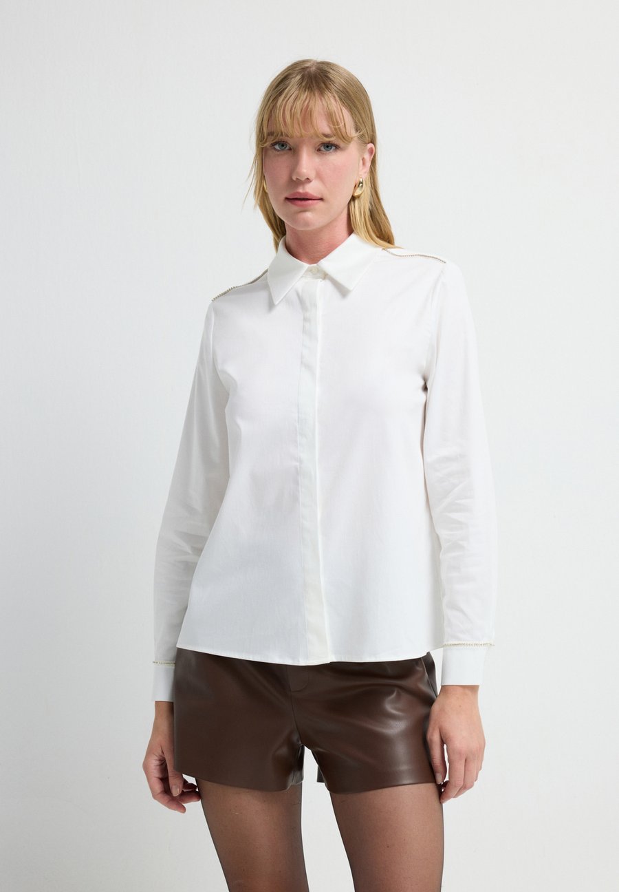 Блуза adL Button-down blouse, White /White
Блуза adL Button-down blouse, White /White
