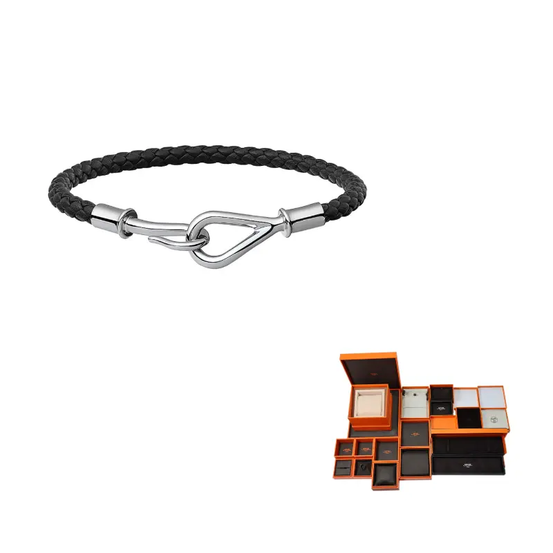 HERMES Массивный браслет из телячьей кожи унисекс черный
HERMES Массивный браслет из телячьей кожи унисекс черный