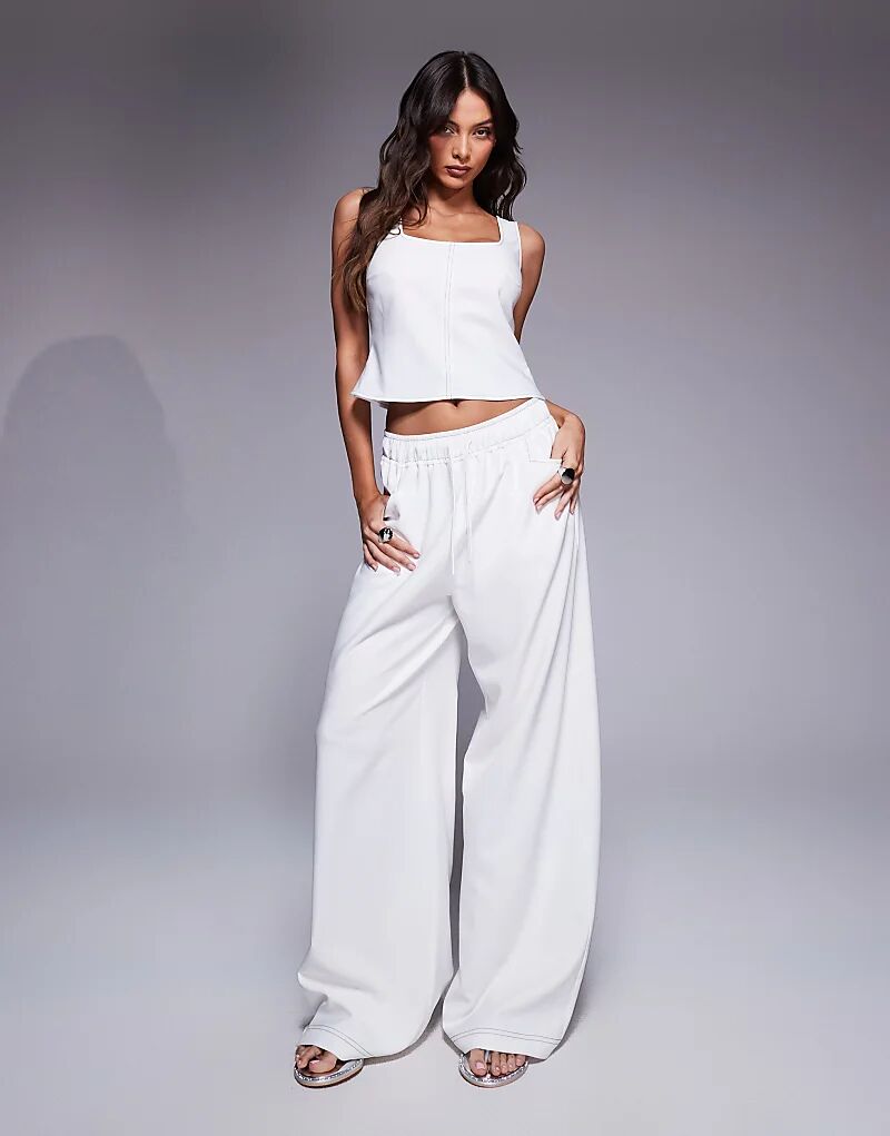 Белые брюки ASOS DESIGN с завязкой на талии и контрастной строчкой — часть комплекта
Белые брюки ASOS DESIGN с завязкой на талии и контрастной строчкой — часть комплекта