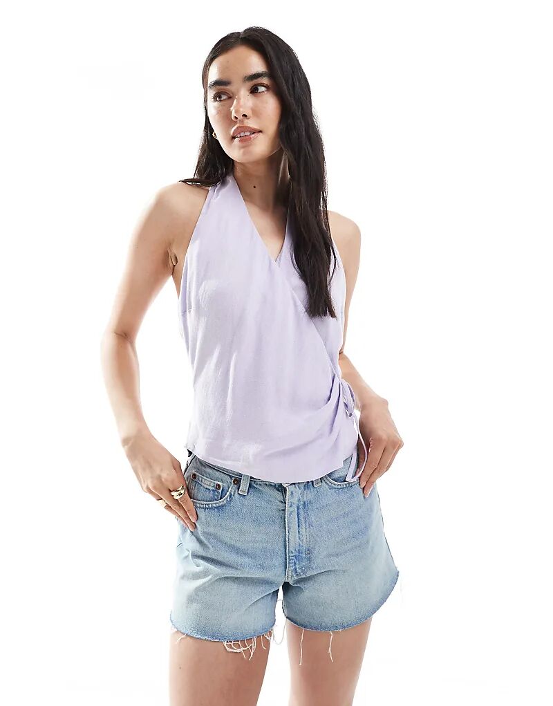 Топ без рукавов с запахом и завязками по бокам ASOS DESIGN сиреневого цвета
Топ без рукавов с запахом и завязками по бокам ASOS DESIGN сиреневого цвета