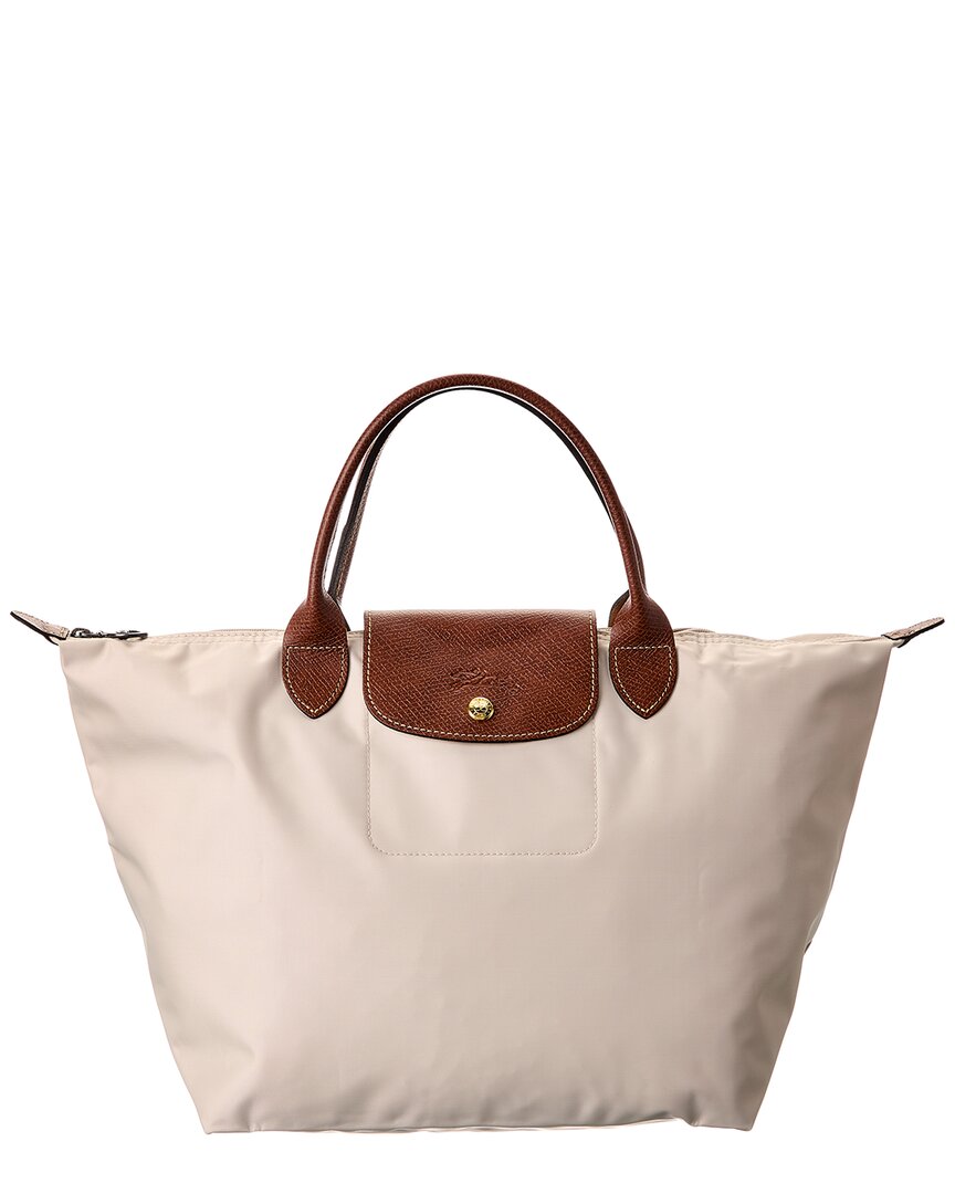 Longchamp Le Pliage Original Средняя Нейлоновая Сумка, бежевый
Longchamp Le Pliage Original Средняя Нейлоновая Сумка, бежевый