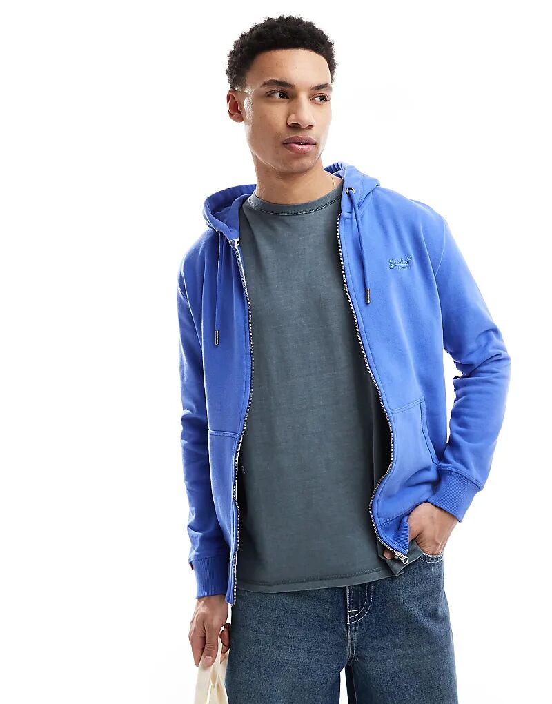 Толстовка Superdry Essential с логотипом на молнии из ткани шамбре синего цвета
Толстовка Superdry Essential с логотипом на молнии из ткани шамбре синего цвета