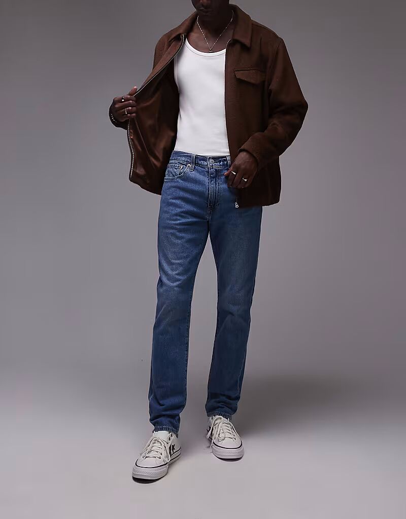 Узкие зауженные джинсы 512 средне-синего цвета Levi'S
Узкие зауженные джинсы 512 средне-синего цвета Levi'S