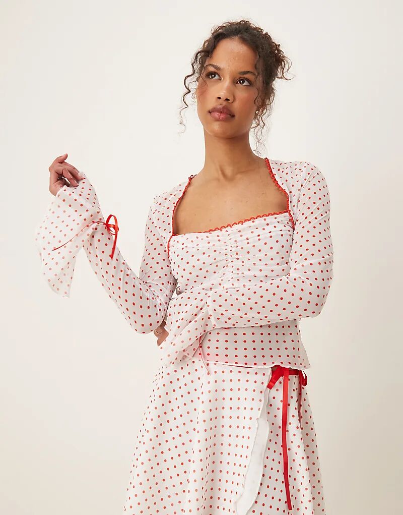 Топ в горошек с оборками на рукавах от Тайлера Макгилливари, белый и красный – часть комплекта
Топ в горошек с оборками на рукавах от Тайлера Макгилливари, белый и красный – часть комплекта