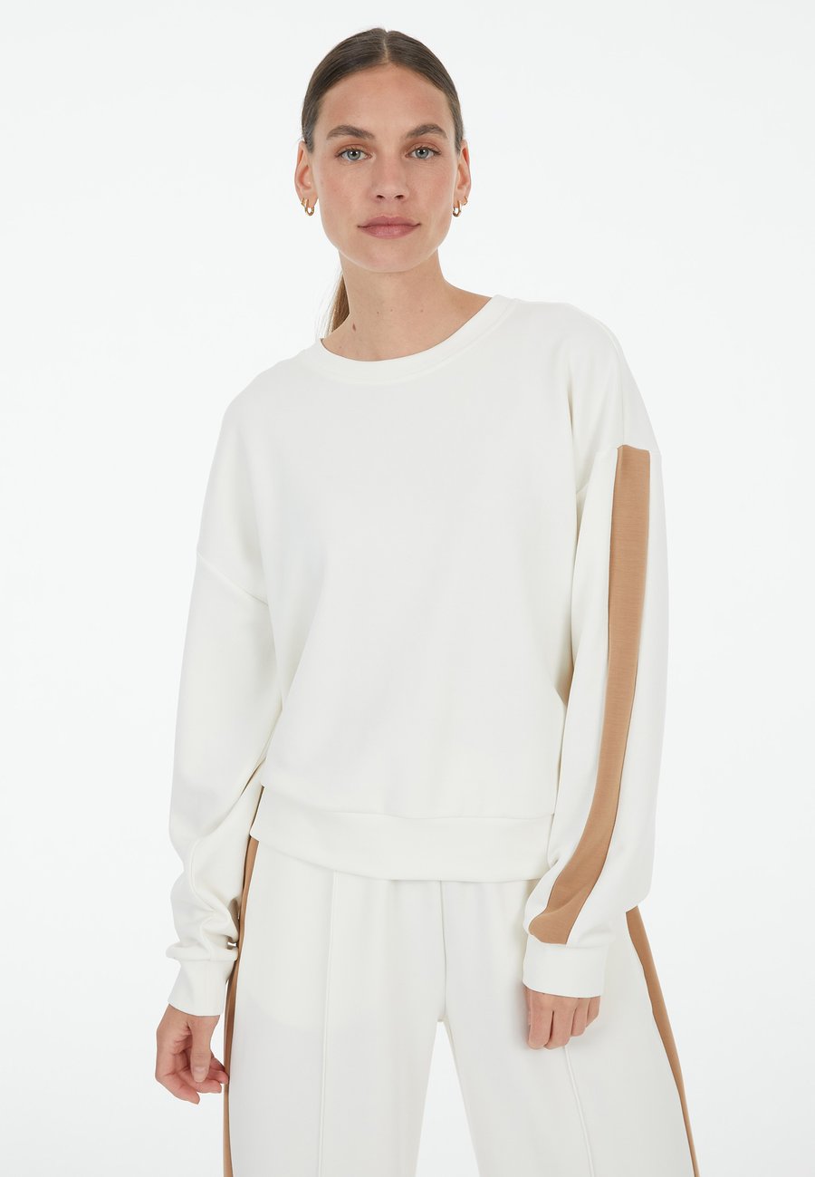 Толстовка Marc Aurel Sweatshirt, Creme Varied/Beige
Толстовка Marc Aurel Sweatshirt, Creme Varied/Beige