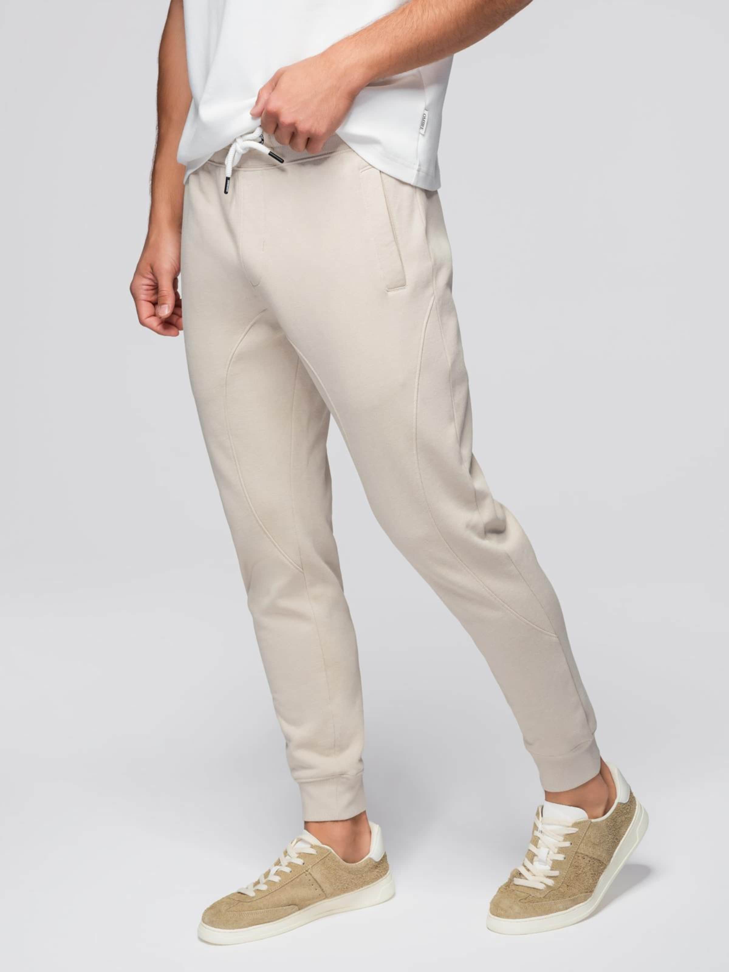 Ombre Брюки-чинос в светло-бежевом цвете
Ombre Брюки-чинос в светло-бежевом цвете