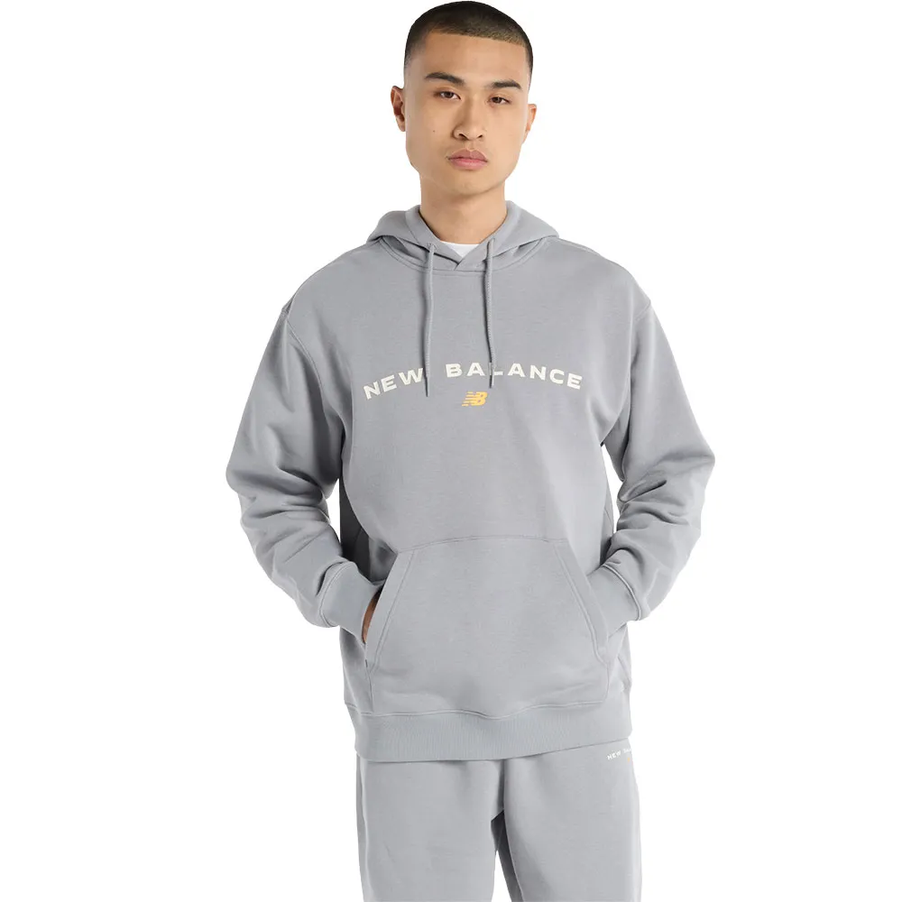 Худи New Balance Reimagined Fleece Graphic, серый 
Худи New Balance Reimagined Fleece Graphic, серый