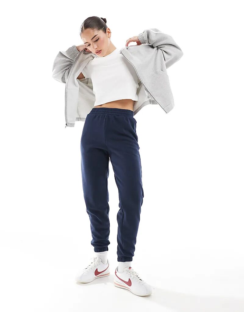 Джоггеры с манжетами в темно-синем цвете New Look
Джоггеры с манжетами в темно-синем цвете New Look