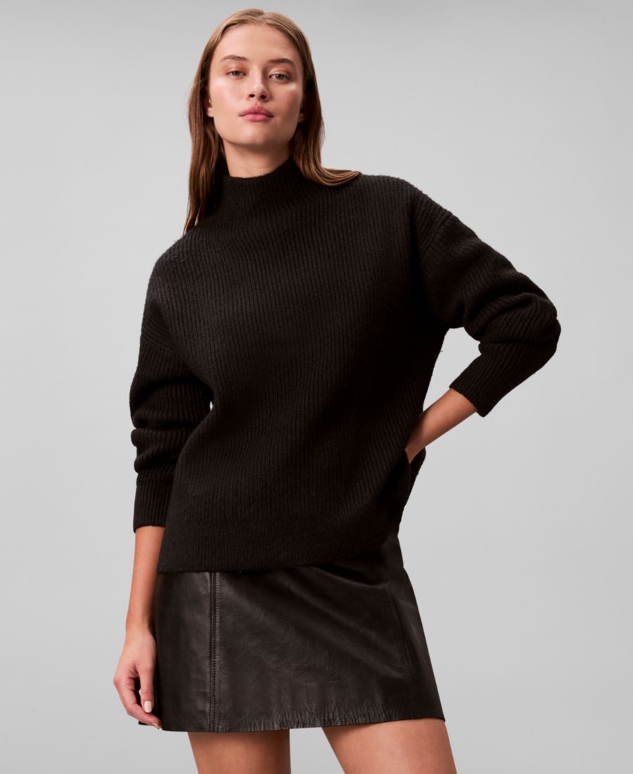 Женский свободный свитер с высоким воротником Calvin Klein, Black
Женский свободный свитер с высоким воротником Calvin Klein, Black
