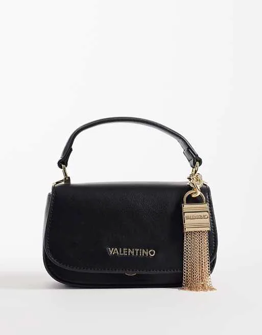Сумка Valentino Iride с верхней ручкой, съемным ремешком через плечо и золотой фурнитурой черного цвета - ЧЕРНЫЙ
Сумка Valentino Iride с верхней ручкой, съемным ремешком через плечо и золотой фурнитурой черного цвета - ЧЕРНЫЙ