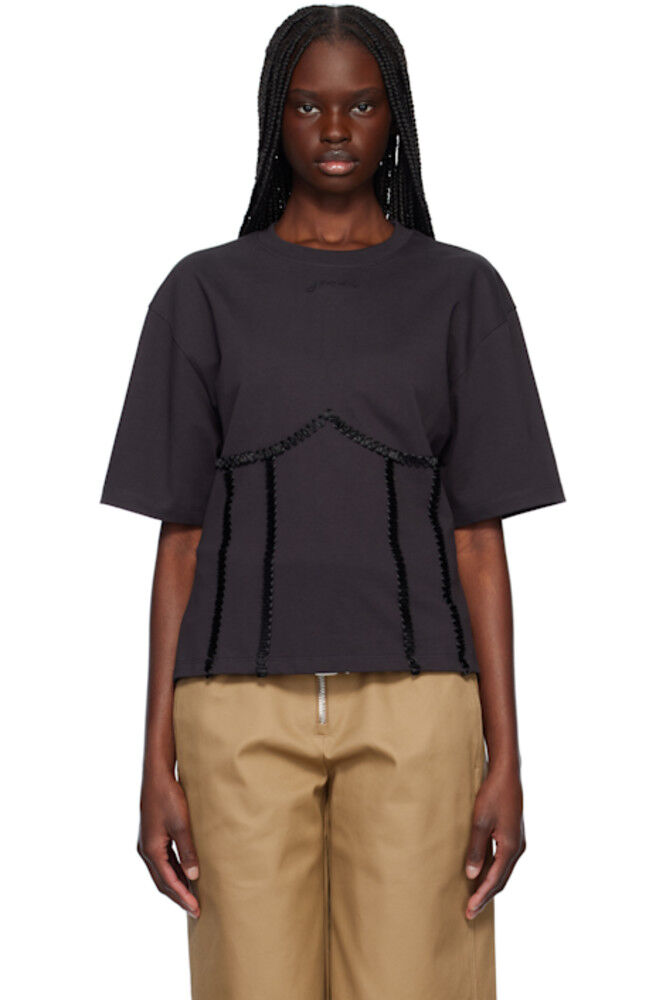 Черная хлопковая футболка с завязками на спине GANNI
Черная хлопковая футболка с завязками на спине GANNI