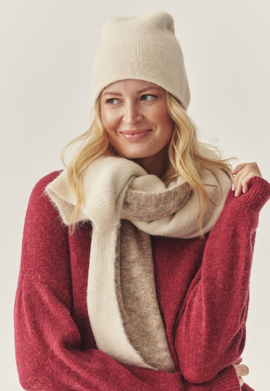 Шапка TATUUM HAT, Beige Melange/Beige
Шапка TATUUM HAT, Beige Melange/Beige