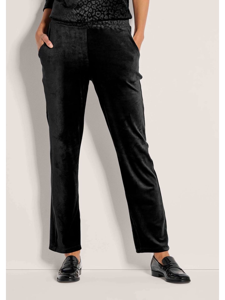 MADELEINE Элегантные черные брюки с леопардовым принтом
MADELEINE Элегантные черные брюки с леопардовым принтом