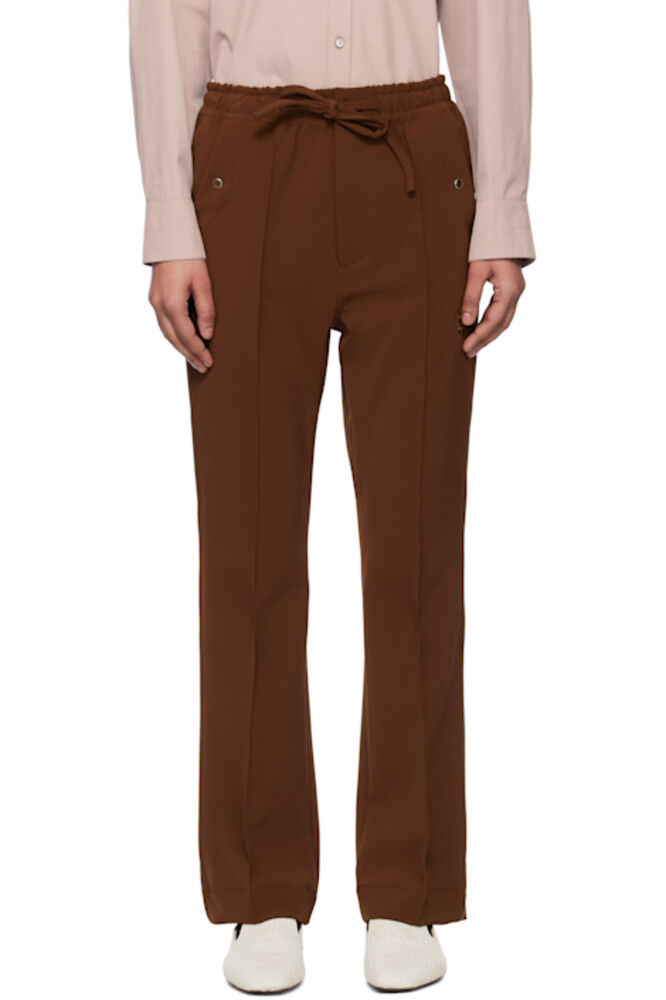 Коричневые ковбойские брюки с кантом NEEDLES
Коричневые ковбойские брюки с кантом NEEDLES