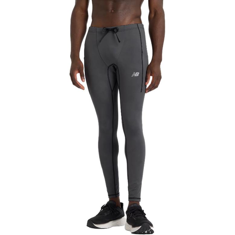 Серые утепленные спортивные брюки New Balance с карманами и светоотражающими элементами
Серые утепленные спортивные брюки New Balance с карманами и светоотражающими элементами