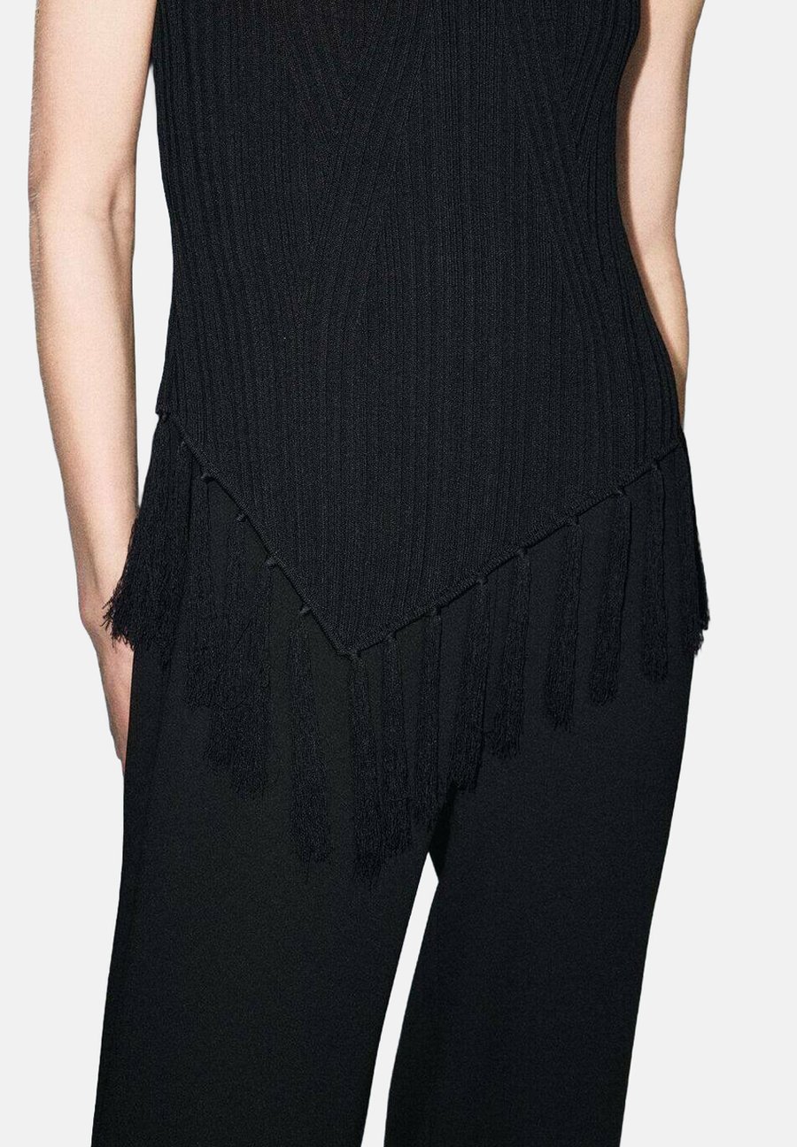 Комбинезон Mango FRINGED , Black
Комбинезон Mango FRINGED , Black
