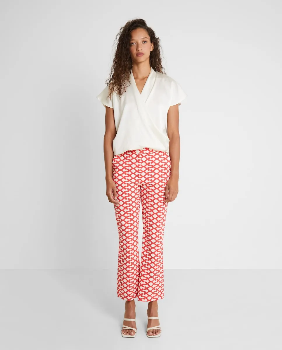 Женские брюки-колокол укороченные с принтом Trucco, коралловый
Женские брюки-колокол укороченные с принтом Trucco, коралловый