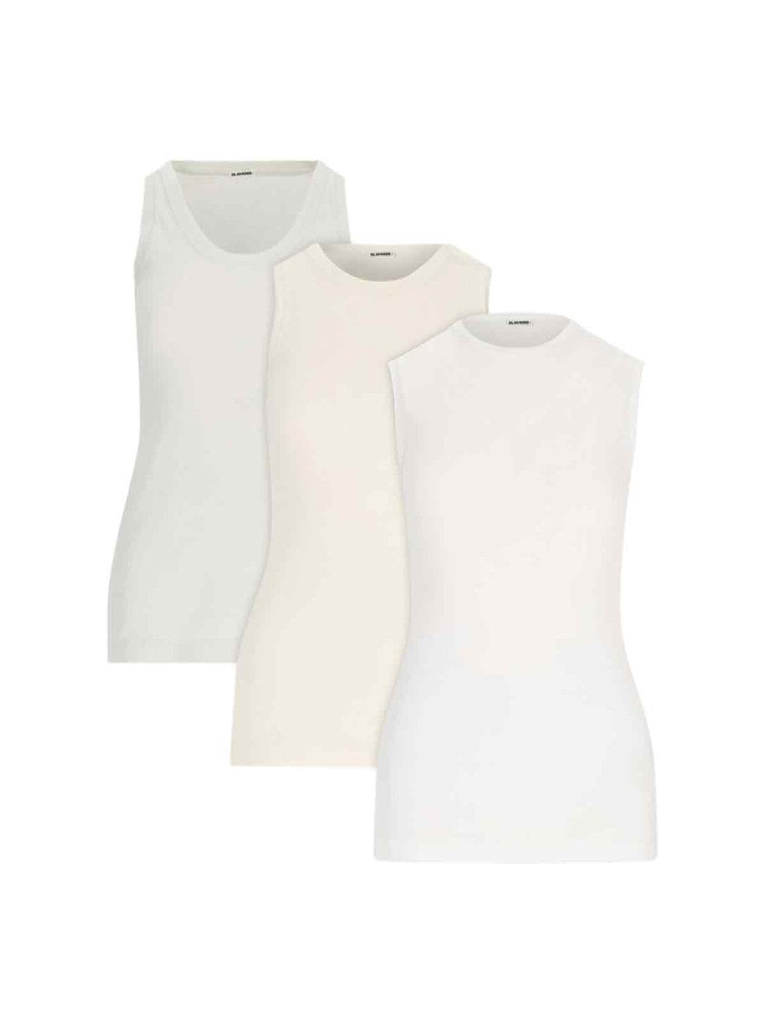 Комплект топов из 3 штук - белый и кремовый Jil Sander
Комплект топов из 3 штук - белый и кремовый Jil Sander