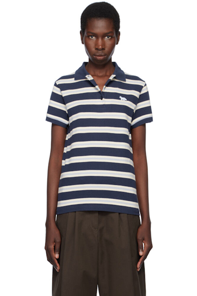 Поло с нашивкой из темно-синего лиса и разноцветными полосками Maison Kitsuné
Поло с нашивкой из темно-синего лиса и разноцветными полосками Maison Kitsuné