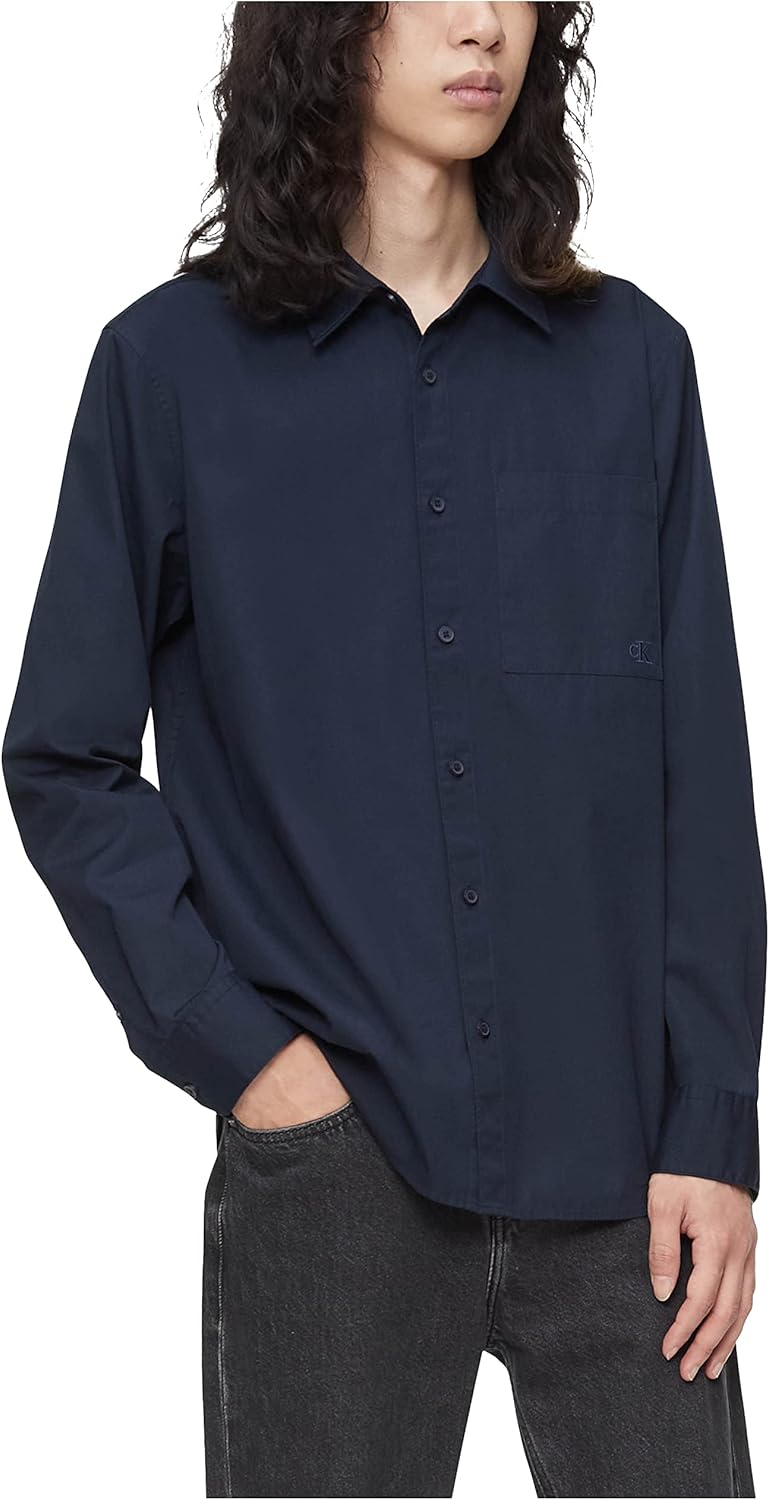 Мужская рубашка Calvin Klein с однотонным карманом и пуговицами, Dark Sapphire
Мужская рубашка Calvin Klein с однотонным карманом и пуговицами, Dark Sapphire