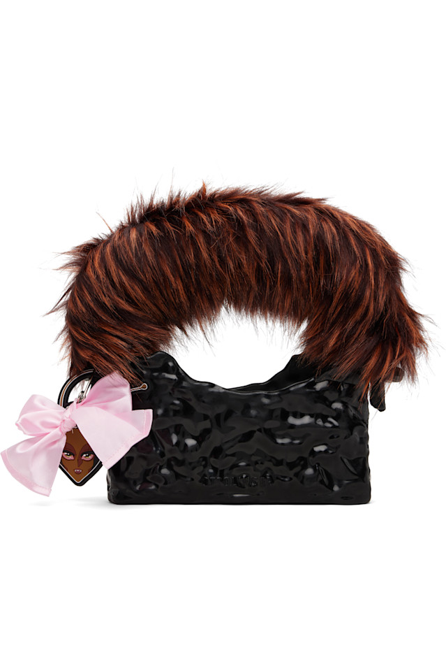 Ottolinger Черная пушистая керамическая сумка в виде багета
Ottolinger Черная пушистая керамическая сумка в виде багета