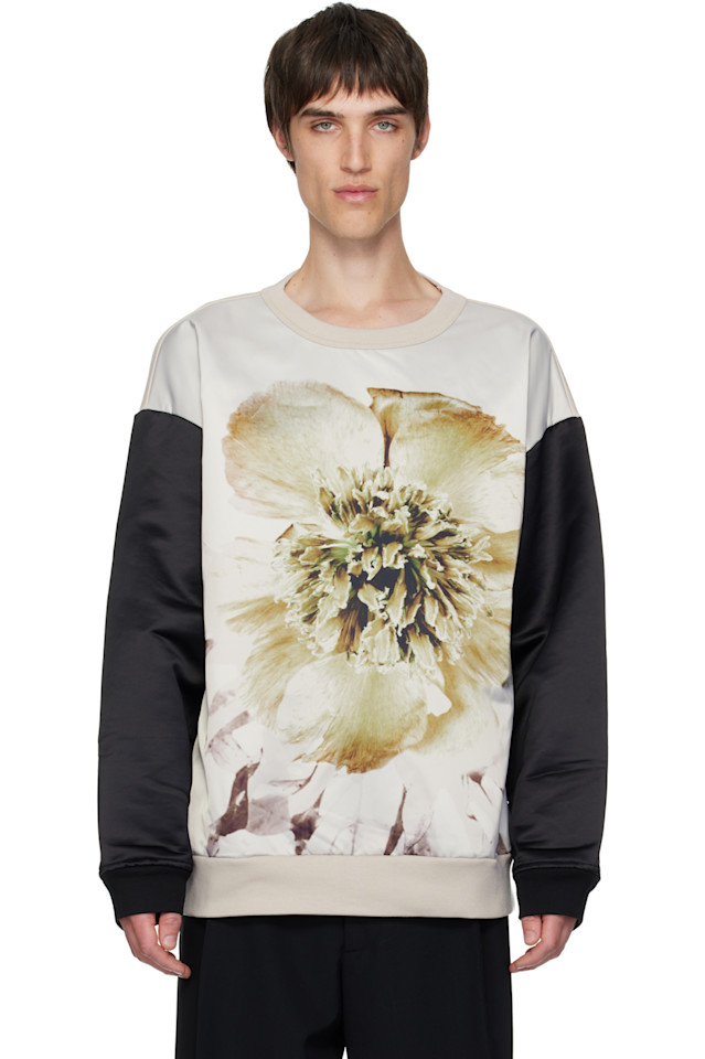 Dries Van Noten Толстовка цвета слоновой кости с черными вставками
Dries Van Noten Толстовка цвета слоновой кости с черными вставками